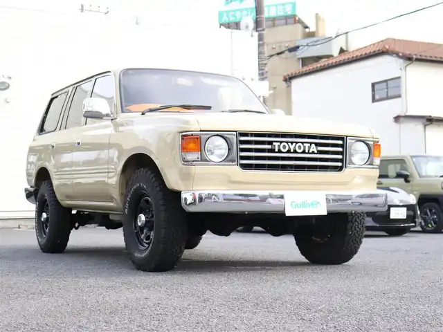 トヨタ ランドクルーザー VX－LTD 神奈川県 1994(平6)年 13.6万km ベージュ 60フェイス（色替え）/リフトアップ/ナローボディ/1ナンバー登録/BF Goodrich All-terrain/：235/85R16（ホワイトレター）/PROUD HORN/社外ウッドステアリング/サンルーフ/メモリナビ/：フルセグTV/：CD DVD再生/：Bluetoothオーディオ/：バックカメラ/社外フロアマット/純正キー/：リモコン有り/ETC/ドラレコ（フロント）/社外シートカバー/ーーーーーーーーーーーーーーーーーーー/取扱説明書