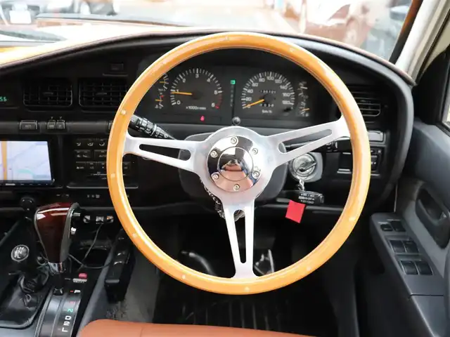 トヨタ ランドクルーザー VX－LTD 神奈川県 1994(平6)年 13.6万km ベージュ 60フェイス（色替え）/リフトアップ/ナローボディ/1ナンバー登録/BF Goodrich All-terrain/：235/85R16（ホワイトレター）/PROUD HORN/社外ウッドステアリング/サンルーフ/メモリナビ/：フルセグTV/：CD DVD再生/：Bluetoothオーディオ/：バックカメラ/社外フロアマット/純正キー/：リモコン有り/ETC/ドラレコ（フロント）/社外シートカバー/ーーーーーーーーーーーーーーーーーーー/取扱説明書
