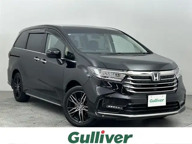 ホンダ オデッセイ アブソルート EX 道央・札幌 2021(令3)年 1.9万km プレミアムスパークルブラックパール ・４WD/・純正10インチメモリナビ（VXU-227DYi）/・CD/DVD/Bluetooth/フルセグ/・後席フリップダウンモニター（VM-221TY）/・全周囲カメラ/・純正エンジンスターター/・純正ビルトインETC2.0/・前後ドライブレコーダー/・両側パワースライドドア/・アダプティブクルーズコントロール/・パーキングアシスト/・標識認識機能/・路外逸脱抑制システム/・先行車発進お知らせ機能/・電動リアゲート/・ハーフレザーシート/・前席シートヒーター/・純正18インチAW/・前後コーナーセンサー/・LEDオートライト/・フォグライト/・純正フロアマット/・純正カーゴマット/・プッシュスタート/・スマートキー/・スペアキー/・取扱説明書/・保証書