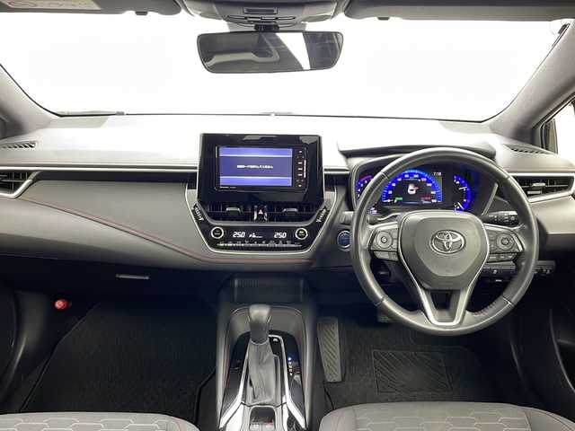 トヨタ カローラ スポーツ ハイブリッドG Z 三重県 2019(令1)年 2.5万km アティチュードブラックマイカ 社外7型ナビ（CNーRE０５WD）/バックカメラ/プリクラッシュセーフティ/レーンディパーチャーアラート/レーダークルーズコントロール/オートハイビーム/クリアランスソナー/LEDヘッドライト/純正フロアマット/ビルトインETC