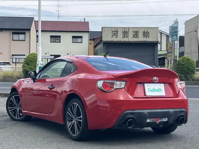 トヨタ ８６ GT 三重県 2013(平25)年 9.7万km ライトニングレッド 柿本２本出しマフラー/サブウーハー(カロッツェリア)　/♪社外SDナビ　/　・Bluetooth・SD録音/　・フルセグ・CD/DVD再生/♪バックカメラ/♪スマートキー/♪プッシュスタート/♪HIDヘッドライト/♪フォグライト /♪オートライト/♪スロットコントローラー/♪純正17インチAW/♪革巻ステアリング/♪パドルシフト/♪社外シフトノブ(純正あり)/♪フロアマット/♪ドアバイザー/♪横滑り防止機能/♪ライトレベリング/♪サイド/カーテンエアバック