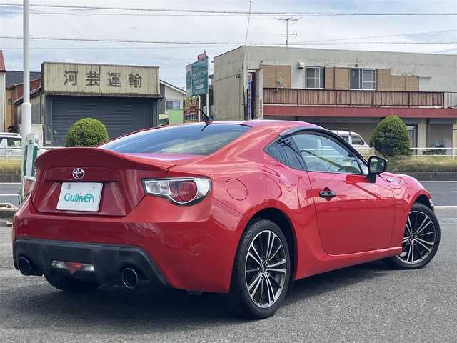 トヨタ ８６ GT 三重県 2013(平25)年 9.7万km ライトニングレッド 柿本２本出しマフラー/サブウーハー(カロッツェリア)　/♪社外SDナビ　/　・Bluetooth・SD録音/　・フルセグ・CD/DVD再生/♪バックカメラ/♪スマートキー/♪プッシュスタート/♪HIDヘッドライト/♪フォグライト /♪オートライト/♪スロットコントローラー/♪純正17インチAW/♪革巻ステアリング/♪パドルシフト/♪社外シフトノブ(純正あり)/♪フロアマット/♪ドアバイザー/♪横滑り防止機能/♪ライトレベリング/♪サイド/カーテンエアバック