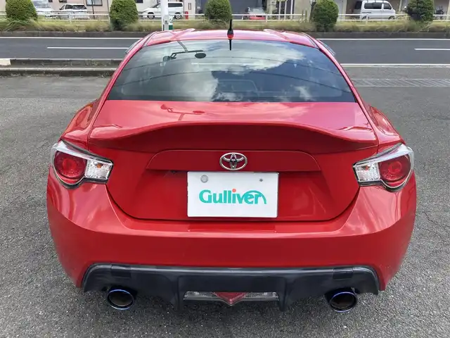 トヨタ ８６ GT 三重県 2013(平25)年 9.7万km ライトニングレッド 柿本２本出しマフラー/サブウーハー(カロッツェリア)　/♪社外SDナビ　/　・Bluetooth・SD録音/　・フルセグ・CD/DVD再生/♪バックカメラ/♪スマートキー/♪プッシュスタート/♪HIDヘッドライト/♪フォグライト /♪オートライト/♪スロットコントローラー/♪純正17インチAW/♪革巻ステアリング/♪パドルシフト/♪社外シフトノブ(純正あり)/♪フロアマット/♪ドアバイザー/♪横滑り防止機能/♪ライトレベリング/♪サイド/カーテンエアバック