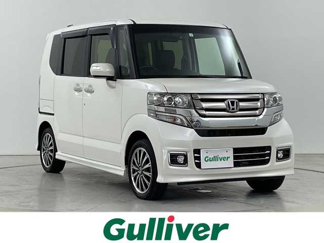 ホンダ Ｎ ＢＯＸ カスタム G ターボ Lパッケージ 道央・札幌 2017(平29)年 3.5万km プレミアムホワイトパールⅡ ・4WD/ターボ/・ディーラーOP７インチインターナビ/・BT/DVD/CD/SD/フルセグ/・バックカメラ/・両側パワースライドドア/・クルーズコントロール/・HIDオートライト/・LEDフォグランプ/・ハーフレザーシート/・シートヒーター/・ヒーテッドドアミラー/・純正15インチAW/・スマートキー×2/・社外エンジンスターター/・電動格納ミラー/・横滑り防止装置/・前後型ドライブレコーダー/・ETC/・冬タイヤAWセット積込