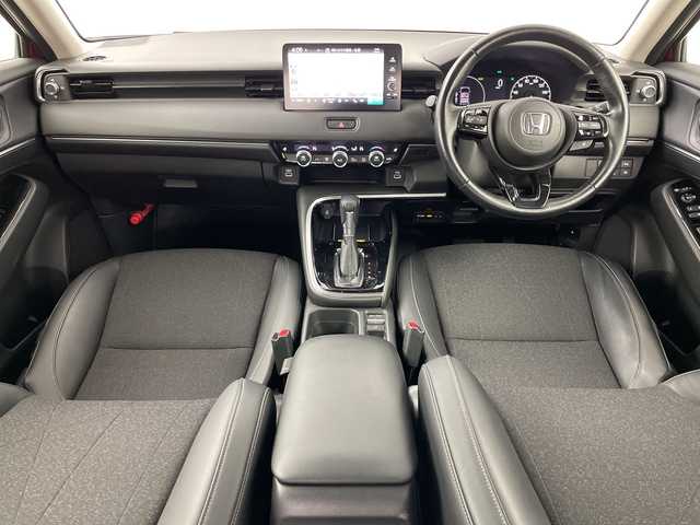 ホンダ ヴェゼル ハイブリッド e:HEV Z 道央・札幌 2021(令3)年 1.2万km プレミアムクリスタルレッドM ・4WD/・寒冷地仕様/・純正ナビ&BT&TV&USB/・バックカメラ/・パワーバックドア/・Honda　SENSING/・レーダークルーズコントロール/・ブラインドスポットモニター/・ハーフレザー/・前席シートヒーター/・ステアリングヒーター/・ドアミラーヒーター/・ビルトインETC2.0/・ワイヤレス充電/・LEDヘッドライト/・オートライト/・スマートキー/・スペアキー/・純正18インチAW/・純正AW付スタッドレス積載