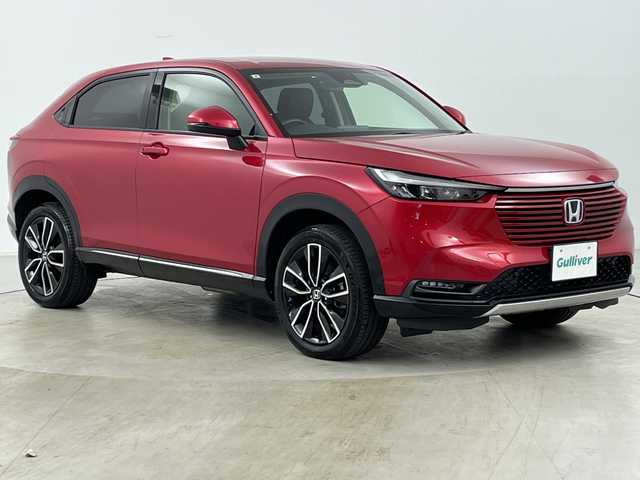 ホンダ ヴェゼル ハイブリッド e:HEV Z 道央・札幌 2021(令3)年 1.2万km プレミアムクリスタルレッドM ・4WD/・寒冷地仕様/・純正ナビ&BT&TV&USB/・バックカメラ/・パワーバックドア/・Honda　SENSING/・レーダークルーズコントロール/・ブラインドスポットモニター/・ハーフレザー/・前席シートヒーター/・ステアリングヒーター/・ドアミラーヒーター/・ビルトインETC2.0/・ワイヤレス充電/・LEDヘッドライト/・オートライト/・スマートキー/・スペアキー/・純正18インチAW/・純正AW付スタッドレス積載