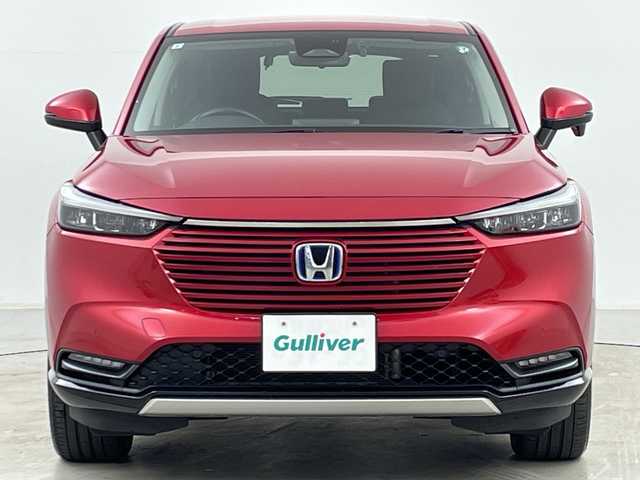 ホンダ ヴェゼル ハイブリッド e:HEV Z 道央・札幌 2021(令3)年 1.2万km プレミアムクリスタルレッドM ・4WD/・寒冷地仕様/・純正ナビ&BT&TV&USB/・バックカメラ/・パワーバックドア/・Honda　SENSING/・レーダークルーズコントロール/・ブラインドスポットモニター/・ハーフレザー/・前席シートヒーター/・ステアリングヒーター/・ドアミラーヒーター/・ビルトインETC2.0/・ワイヤレス充電/・LEDヘッドライト/・オートライト/・スマートキー/・スペアキー/・純正18インチAW/・純正AW付スタッドレス積載