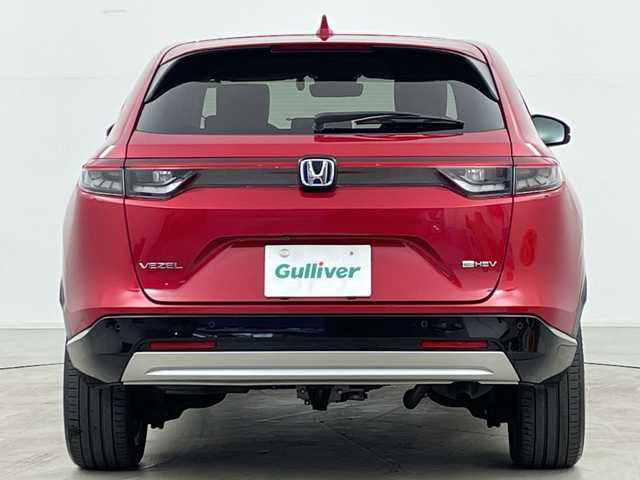 ホンダ ヴェゼル ハイブリッド e:HEV Z 道央・札幌 2021(令3)年 1.2万km プレミアムクリスタルレッドM ・4WD/・寒冷地仕様/・純正ナビ&BT&TV&USB/・バックカメラ/・パワーバックドア/・Honda　SENSING/・レーダークルーズコントロール/・ブラインドスポットモニター/・ハーフレザー/・前席シートヒーター/・ステアリングヒーター/・ドアミラーヒーター/・ビルトインETC2.0/・ワイヤレス充電/・LEDヘッドライト/・オートライト/・スマートキー/・スペアキー/・純正18インチAW/・純正AW付スタッドレス積載