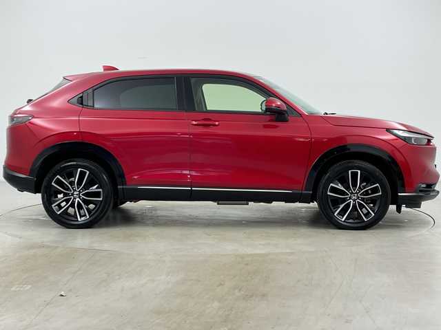 ホンダ ヴェゼル ハイブリッド e:HEV Z 道央・札幌 2021(令3)年 1.2万km プレミアムクリスタルレッドM ・4WD/・寒冷地仕様/・純正ナビ&BT&TV&USB/・バックカメラ/・パワーバックドア/・Honda　SENSING/・レーダークルーズコントロール/・ブラインドスポットモニター/・ハーフレザー/・前席シートヒーター/・ステアリングヒーター/・ドアミラーヒーター/・ビルトインETC2.0/・ワイヤレス充電/・LEDヘッドライト/・オートライト/・スマートキー/・スペアキー/・純正18インチAW/・純正AW付スタッドレス積載