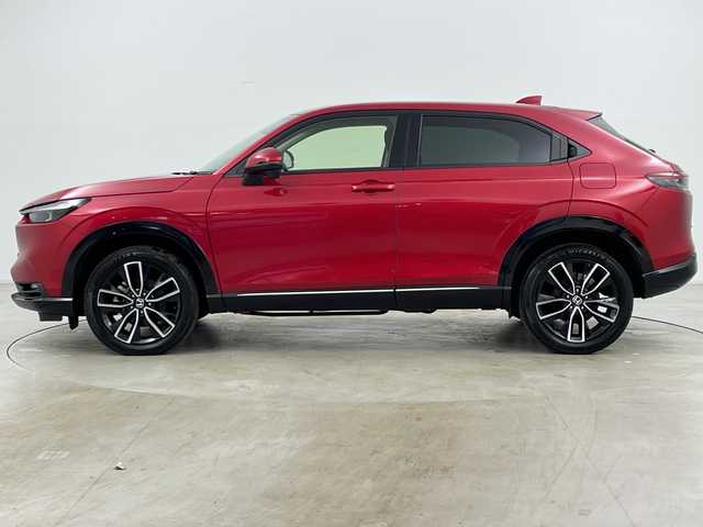 ホンダ ヴェゼル ハイブリッド e:HEV Z 道央・札幌 2021(令3)年 1.2万km プレミアムクリスタルレッドM ・4WD/・寒冷地仕様/・純正ナビ&BT&TV&USB/・バックカメラ/・パワーバックドア/・Honda　SENSING/・レーダークルーズコントロール/・ブラインドスポットモニター/・ハーフレザー/・前席シートヒーター/・ステアリングヒーター/・ドアミラーヒーター/・ビルトインETC2.0/・ワイヤレス充電/・LEDヘッドライト/・オートライト/・スマートキー/・スペアキー/・純正18インチAW/・純正AW付スタッドレス積載