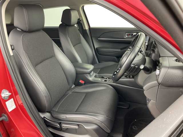 ホンダ ヴェゼル ハイブリッド e:HEV Z 道央・札幌 2021(令3)年 1.2万km プレミアムクリスタルレッドM ・4WD/・寒冷地仕様/・純正ナビ&BT&TV&USB/・バックカメラ/・パワーバックドア/・Honda　SENSING/・レーダークルーズコントロール/・ブラインドスポットモニター/・ハーフレザー/・前席シートヒーター/・ステアリングヒーター/・ドアミラーヒーター/・ビルトインETC2.0/・ワイヤレス充電/・LEDヘッドライト/・オートライト/・スマートキー/・スペアキー/・純正18インチAW/・純正AW付スタッドレス積載