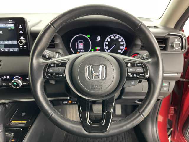 ホンダ ヴェゼル ハイブリッド e:HEV Z 道央・札幌 2021(令3)年 1.2万km プレミアムクリスタルレッドM ・4WD/・寒冷地仕様/・純正ナビ&BT&TV&USB/・バックカメラ/・パワーバックドア/・Honda　SENSING/・レーダークルーズコントロール/・ブラインドスポットモニター/・ハーフレザー/・前席シートヒーター/・ステアリングヒーター/・ドアミラーヒーター/・ビルトインETC2.0/・ワイヤレス充電/・LEDヘッドライト/・オートライト/・スマートキー/・スペアキー/・純正18インチAW/・純正AW付スタッドレス積載