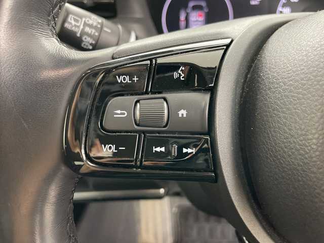 ホンダ ヴェゼル ハイブリッド e:HEV Z 道央・札幌 2021(令3)年 1.2万km プレミアムクリスタルレッドM ・4WD/・寒冷地仕様/・純正ナビ&BT&TV&USB/・バックカメラ/・パワーバックドア/・Honda　SENSING/・レーダークルーズコントロール/・ブラインドスポットモニター/・ハーフレザー/・前席シートヒーター/・ステアリングヒーター/・ドアミラーヒーター/・ビルトインETC2.0/・ワイヤレス充電/・LEDヘッドライト/・オートライト/・スマートキー/・スペアキー/・純正18インチAW/・純正AW付スタッドレス積載