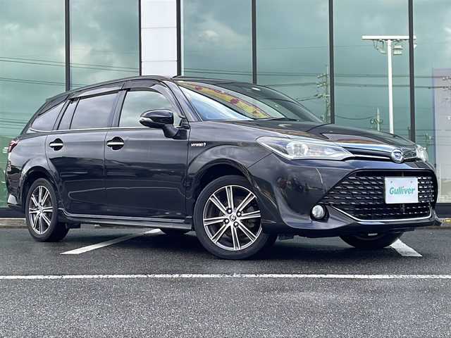 トヨタ カローラ フィールダー ハイブリッドG ダブルバイビー 福岡県 2015(平27)年 14.6万km ブラックマイカ 社外メモリナビ/MDV-Z702W/フルセグTV/BT接続/スマートキー/プッシュスタート/nanoeエアコン/ビルトインETC/純正ドアバイザー/純正フロアマット/純正16インチアルミホイール