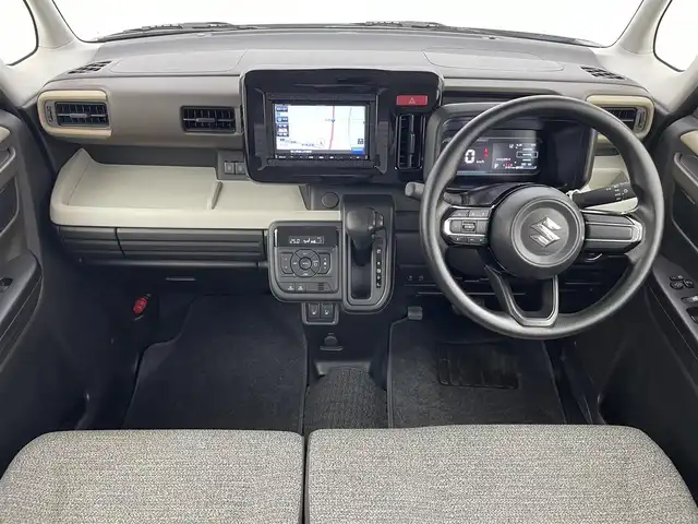 スズキ スペーシア HYBRID X 富山県 2024(令6)年 0.4万km ピュアホワイトP 社外ナビ（AM/FM/CD/BT/フルセグ）/両側パワースライドドア/シートヒーター/衝突被害軽減システム/レーンキープアシスト/コーナーセンサー/横滑り防止装置/アイドリングストップ/社外フロアマット/オートLEDライト/リアサーキュレーター/スマートキー/スペアキー