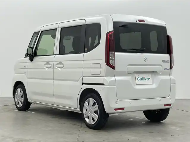 スズキ スペーシア HYBRID X 富山県 2024(令6)年 0.4万km ピュアホワイトP 社外ナビ（AM/FM/CD/BT/フルセグ）/両側パワースライドドア/シートヒーター/衝突被害軽減システム/レーンキープアシスト/コーナーセンサー/横滑り防止装置/アイドリングストップ/社外フロアマット/オートLEDライト/リアサーキュレーター/スマートキー/スペアキー