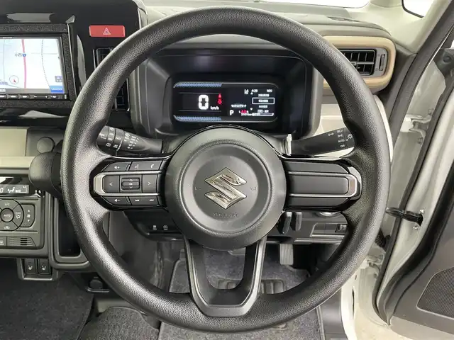 スズキ スペーシア HYBRID X 富山県 2024(令6)年 0.4万km ピュアホワイトP 社外ナビ（AM/FM/CD/BT/フルセグ）/両側パワースライドドア/シートヒーター/衝突被害軽減システム/レーンキープアシスト/コーナーセンサー/横滑り防止装置/アイドリングストップ/社外フロアマット/オートLEDライト/リアサーキュレーター/スマートキー/スペアキー