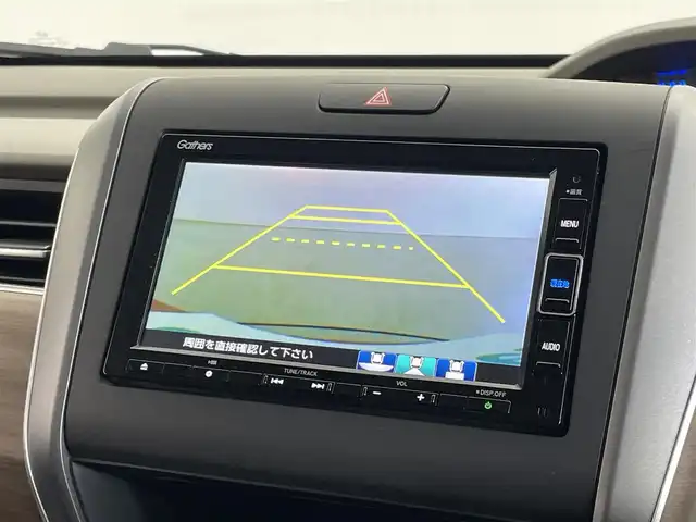ホンダ フリード ハイブリット G ホンダセンシング 埼玉県 2020(令2)年 2.7万km プレミアムクリスタルオレンジM センシング/・衝突軽減ブレーキ（CMBS）/・誤発進抑制機能/・後方誤発進抑制機能/・歩行者事故提言ステアリング/・路外逸脱抑制機能/・先行車発進お知らせ機能/・標識認識機能/・アクティブクルーズコントロール/・車線維持支援システム/純正ナビ（VXM-204VFI)/バックカメラ/プッシュスタート/純正フロアマット/両側パワースライドドア/純正ETC2.0/シートヒーター（運転席＆助手席）/フロントデアイサー/LEDヘッドライト