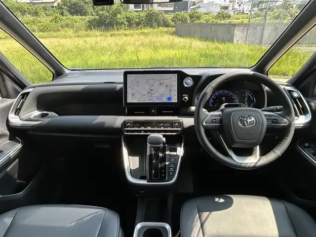 トヨタ ノア ハイブリッド S－Z 長崎県 2023(令5)年 1.8万km アティチュードブラックマイカ ワンオーナー/純正10.5インチナビ/(CD/DVD/BT/フルセグ)/バックカメラ/衝突軽減ブレーキ/レーンアシスト/ブラインドスポットモニター/レーダークルーズ/ETC2.0/両側パワースライドドア/前後ドライブレコーダー/オートライト/純正17インチAW/USB/HDMI/Cタイプ