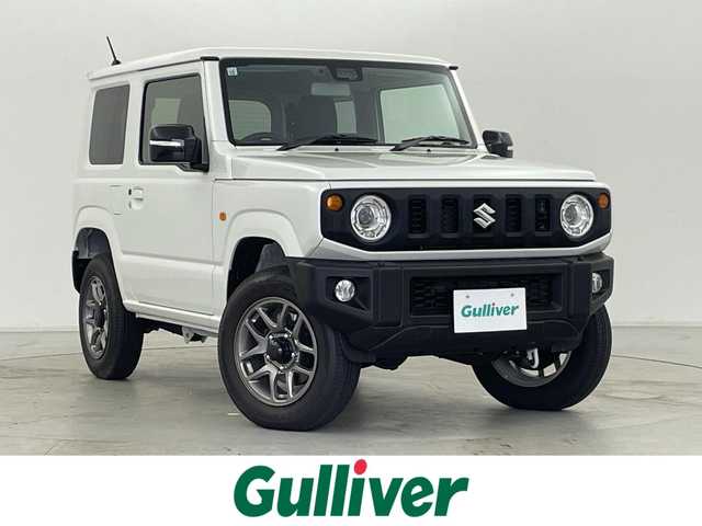 スズキ ジムニー XC 群馬県 2024(令6)年 0.1万km ピュアホワイトP ５速ＭＴ　パートタイム４ＷＤ　デュアルカメラブレーキサポート　前席シートヒーター　横滑り防止　ＬＥＤヘッドランプ　オートライト　フォグランプ　Ｒソナー　スマートキー　プッシュスタート　ターボ　禁煙車