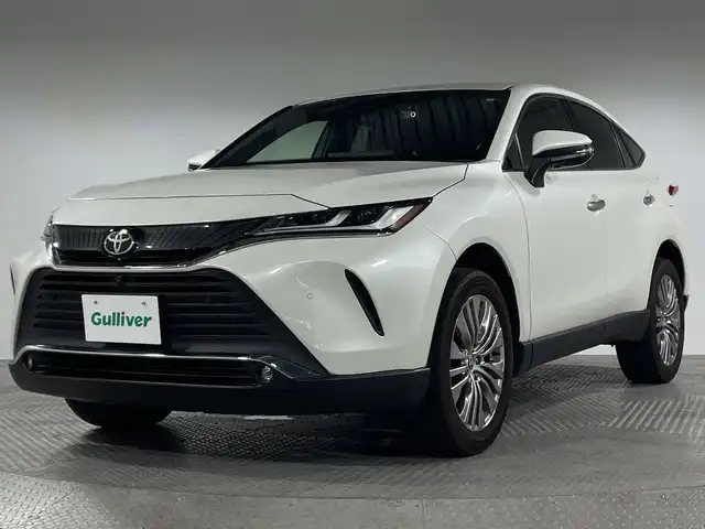 トヨタ ハリアー Z 神奈川県 2020(令2)年 2.9万km ホワイトパールクリスタルシャイン 純正12.3型ディスプレイオーディオ/AM FM フルセグ Bluetooth Miracast USB AUX/パノラマミックビューモニター/JBLプレミアムサウンド/レーントレーシングアラート/プリクラッシュセーフティ/ブラインドスポットモニター/クリアランスソナー/リヤクロストラフィックアラート/ヘッドアップディスプレイ/ロードサインアシスト/デジタルインナーミラー/ハーフレザーシート/運転席パワーシート/パワーバックドア/ステアリングリモコン/ビルトインETC2.0/前後ドライブレコーダー/純正フロアマット/純正19インチアルミホイル/LEDヘッドライト/オートライト/オートマチックハイビーム/スマートキー/スペアキー