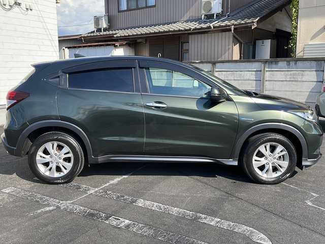 ホンダ ヴェゼル ハイブリッド X 長野県 2014(平26)年 9.5万km ミスティックグリーンパール (株)IDOMが運営する【じしゃロン長野店】の自社ローン専用車両になります/こちらは現金またはオートローンご利用時の価格です。自社ローンご希望の方は別途その旨お申付け下さい./純正ナビ/バックカメラ/ステアリングスイッチ/ETC/クルーズコントロール/シートヒーター/スマートキープッシュスタート