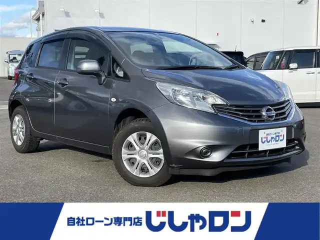 日産 ノート X FOUR 福島県 2013(平25)年 7万km ダークメタルグレー (株)IDOMが運営する【じしゃロン福島店】の自社ローン専用車両になります。こちらは現金またはオートローンご利用時の価格です。自社ローンご希望の方は別途その旨お申付け下さい/　/・純正ナビ（CD/DVD/SD/ワンセグ）/・プッシュスタート/・パートタイム4WD/・スマートキー 2個/・SWサマータイヤ積込 165/70R14