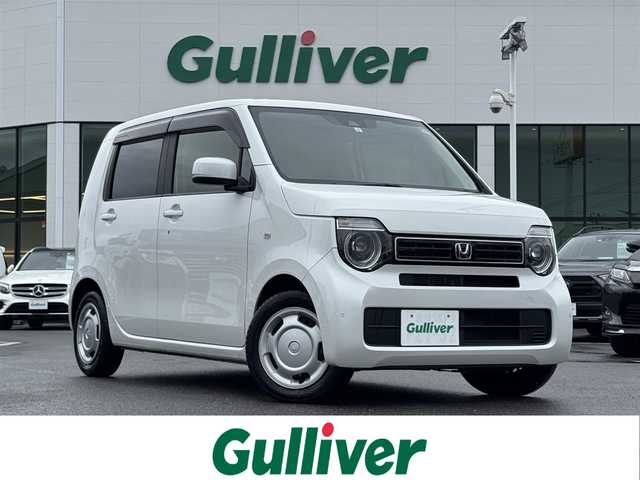 ホンダ Ｎ ＷＧＮ L ホンダセンシング 愛媛県 2021(令3)年 6万km プラチナホワイトパール 禁煙車/登録時走行距離59542km/ディーラーオプション純正ナビ（VXM-214VFi）/CD/DVD/フルセグTV/Bluetooth/バックカメラ/純正前後ドライブレコーダー/ビルトインETC/運転席シートヒーター/オートライト/LEDヘッドライト/衝突軽減ブレーキ/横滑り防止装置/レーンキープサポート/レーダークルーズコントロール/スマートキー/プッシュスタートボタン/純正フロアマット