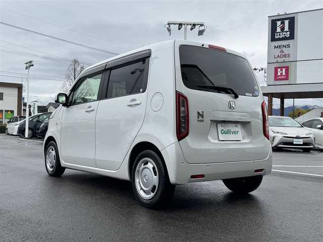 ホンダ Ｎ ＷＧＮ L ホンダセンシング 愛媛県 2021(令3)年 6万km プラチナホワイトパール 禁煙車/登録時走行距離59542km/ディーラーオプション純正ナビ（VXM-214VFi）/CD/DVD/フルセグTV/Bluetooth/バックカメラ/純正前後ドライブレコーダー/ビルトインETC/運転席シートヒーター/オートライト/LEDヘッドライト/衝突軽減ブレーキ/横滑り防止装置/レーンキープサポート/レーダークルーズコントロール/スマートキー/プッシュスタートボタン/純正フロアマット