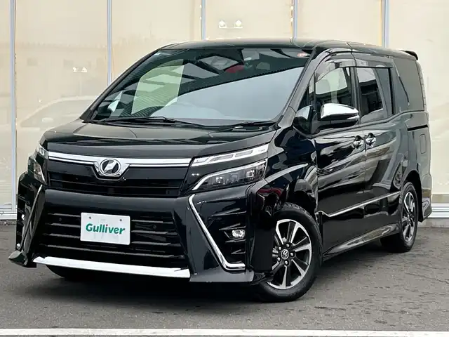 トヨタ ヴォクシー ZS 煌Ⅱ 神奈川県 2020(令2)年 3.1万km ブラック 純正ナビ/フルセグ/Bluetooth/CD/DVD/両側パワースライドドア /バックカメラ　/クルーズコントロール　/コーナーセンサー　/レーンアシスト　　/ビルドインETC　/ドライブレコーダー　/LEDヘッドライト　/フォグライト　/オートライト　/スマートキー/プッシュスタート/スペアキー/純正アルミホイール/社外フロアマット/ABS/横滑り防止装置/衝突被害軽減システム/盗難防止装置/取扱説明書/保証書