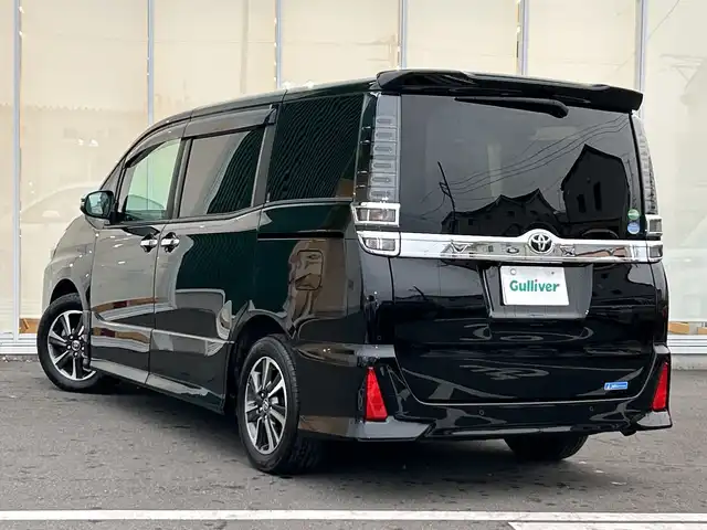 トヨタ ヴォクシー ZS 煌Ⅱ 神奈川県 2020(令2)年 3.1万km ブラック 純正ナビ/フルセグ/Bluetooth/CD/DVD/両側パワースライドドア /バックカメラ　/クルーズコントロール　/コーナーセンサー　/レーンアシスト　　/ビルドインETC　/ドライブレコーダー　/LEDヘッドライト　/フォグライト　/オートライト　/スマートキー/プッシュスタート/スペアキー/純正アルミホイール/社外フロアマット/ABS/横滑り防止装置/衝突被害軽減システム/盗難防止装置/取扱説明書/保証書