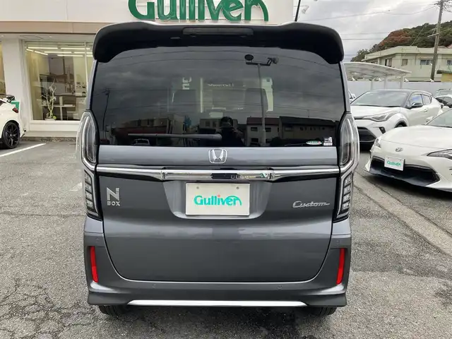 ホンダ Ｎ ＢＯＸ カスタム L ターボ 三重県 2021(令3)年 2.4万km シャイニンググレーM ワンオーナー/登録時走行距離23401km/ターボ/♪ホンダセンシング/　・CMBC(衝突軽減ブレーキ）・誤発進抑制機能/　・後方誤発進抑制機能・歩行者事故低ステアリング/　・路外逸脱抑制機能・先行車発進お知らせ機能/　・標識認識機能・オートハイビーム/♪社外ストラーダナビ/　・フルセグ・Bluetoothオーディオ/　・DVD・SD録音/♪バックカメラ/♪両側パワースライドドア/♪LEDヘッドライト/♪LEDフォグライト/♪ACC（アダプティブクルーズコントロール）/♪ハーフレザーシート/♪D/N席シートヒーター/♪アイドリングストップ/♪パドルシフト/♪スマートキー×2/♪プッシュスタート/♪ステアリングスイッチ/♪革巻きステアリング/♪オートリトラクタブルミラー/♪ウィンカーミラー/♪ビルトインETC/♪ドライブレコーダー前後/♪シートバックテーブル(D/N席)/♪フロアマット/♪プライバシーガラス/♪ドアバイザー