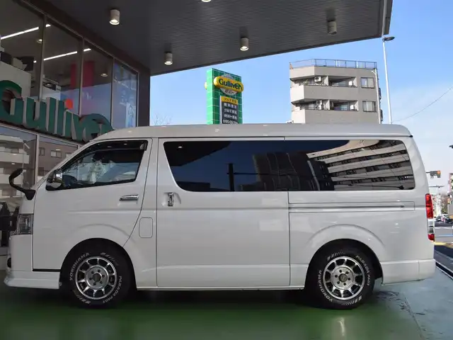 トヨタ ハイエース GL 神奈川県 2019(平31)年 2.7万km ホワイトパールクリスタルシャイン ワンオーナー/後席オリジナル仮装あり/（ベット＆リビングテーブル）/後席モニター/ローダウン/ハイルーフ/カロッテェリア2WAYナビ/バックカメラ/地デジ視聴可/左後パワースライドドア/社外フリップダウンモニター/フロントスポイラー/オートライト/デジタルインナーミラー/スペアキー×１/ビルトインETC/新車時整備手帳/【保証書】/取扱説明書