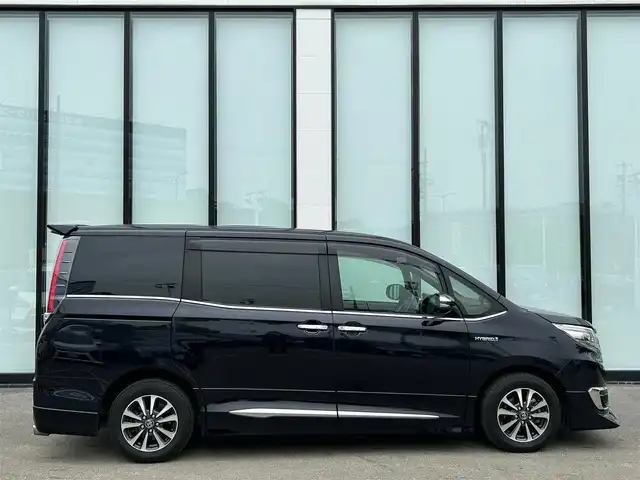 トヨタ エスクァイア ハイブリッド Gi プレミアムパッケージ 大阪府 2018(平30)年 6.1万km スパークリングブラックパールクリスタルシャイン 純正１１インチナビ/   フルセグTV/CD/DVD/Bluetooth/USB/バックモニター/12.1インチ後席モニター/衝突軽減ブレーキ/社外エアロ/純正15インチアルミホイール/前席シートヒーター/シートカバー付き/両側パワースライドドア/クルーズコントロール/レーンキープアシスト/アイドリングストップ/オートマチックハイビーム/ドライブレコーダー/プッシュスタート/スマートキー/ＥＴＣ/ＬＥＤライト/禁煙車