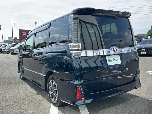 トヨタ ヴォクシー ZS 煌Ⅱ 岐阜県 2019(平31)年 4.4万km ブラッキッシュアゲハガラスフレーク 登録時走行距離43545km/純正１１インチＳＤナビ　/フルセグＴＶ　/両側パワースライドドア　/フリップダウンモニター１２，８インチ　/純正アルミホイール　/純正フロアマット/純正エアロ（前方）/バックカメラ　/前後ドライブレコーダー　/クルーズコントロール　/ドアバイザー/ＬＥＤライト/フォグランプ/オートライト　/ビルトインＥＴＣ/プッシュスタート/スマートキー/スペアキー1本/レーンキープアシスト/アイドリングストップ/横滑り防止装置/盗難防止装置/衝突被害軽減システム/USB入力端子
