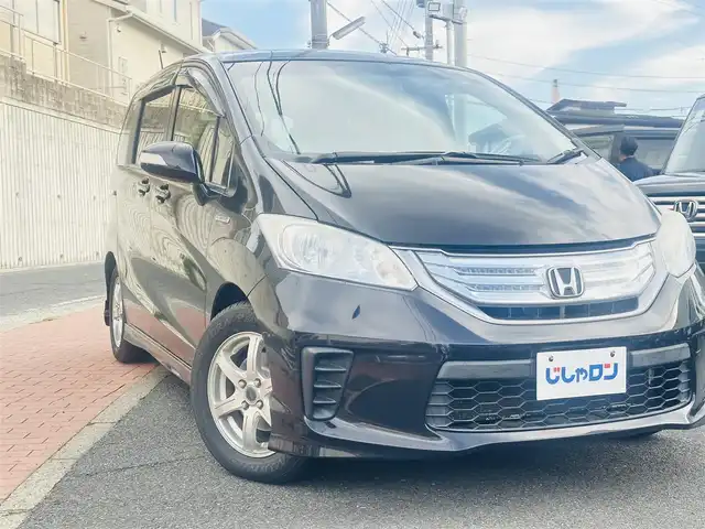 ホンダ フリード ハイブリット ジャストセレクション 福岡県 2012(平24)年 8.9万km プレミアムブラキッシュパール (株)IDOMが運営する【じしゃロン八幡西店】の自社ローン専用車両になります。こちらは現金またはオートローンご利用時の価格です。自社ローンご希望の方は別途その旨お申付け下さい/純正HDDナビ/CD、DVD、MSV、ワンセグTV/ハーフレザーシート/クルーズコントロール/ドライブレコーダー(ZDR016)/バックカメラ/ビルトインETC/ステアリングリモコン/スマートキー/両側パワースライドドア/オートライト/ISOFIX/横滑り防止/ドアバイザー/サマータイヤ4本