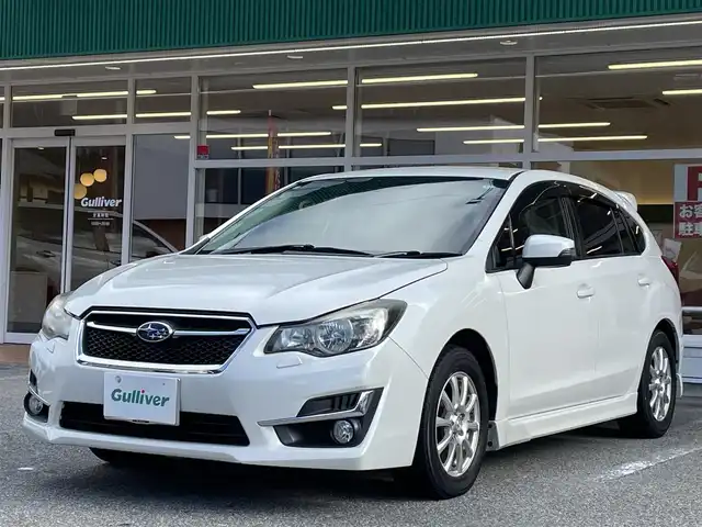 スバル インプレッサ スポーツ 1．6i－S 岐阜県 2015(平27)年 14.5万km クリスタルホワイトP ワンオーナー/4WD/SDナビ/【Bluetooth．CD.DVD.AM/FM．USB】/ハーフレザーシート/純正フロアマット/バックカメラ/ETC/横滑り防止装置/ウィンカーミラー/ドアバイザー/キセノンヘッドライト/フォグライト/スマートキー/積み込みサマータイヤ/保証書/取扱説明書/スペアキー