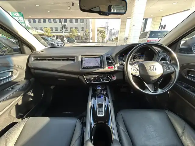 ホンダ ヴェゼル ハイブリッド Z 岡山県 2015(平27)年 4.6万km クリスタルブラックパール 登録時走行距離45112km/純正SDナビ(CD&DVD&USB&BT)/バックカメラ/ETC/フルセグTV/プッシュスタート/スマートキー/クルーズコントロール/衝突軽減システム/保証書/取扱説明書