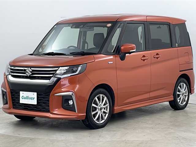 スズキ ソリオ HV MZ 道央・札幌 2021(令3)年 9.2万km フレイムオレンジPM ・4WD/・寒冷地仕様/・純正メモリナビ&CD&DVD&BT&USB&フルセグ/・全方位モニター/・両側パワースライドドア/・レーダークルーズコントロール/・衝突軽減ブレーキ/・レーンキープアシスト/・コーナーセンサー/・HUD/・ビルトインETC/・シートヒーター(D/N)/・ドアミラーヒーター/・全席シートカバー/・ウォークスルー/・ステアリングスイッチ/・純正エンジンスターター/・純正前後ドライブレコーダー/・純正フロアマット/・LEDヘッドライト/・LEDフォグランプ/・純正AW付夏タイヤ積載