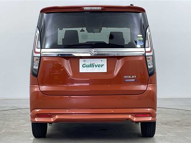 スズキ ソリオ HV MZ 道央・札幌 2021(令3)年 9.2万km フレイムオレンジPM ・4WD/・寒冷地仕様/・純正メモリナビ&CD&DVD&BT&USB&フルセグ/・全方位モニター/・両側パワースライドドア/・レーダークルーズコントロール/・衝突軽減ブレーキ/・レーンキープアシスト/・コーナーセンサー/・HUD/・ビルトインETC/・シートヒーター(D/N)/・ドアミラーヒーター/・全席シートカバー/・ウォークスルー/・ステアリングスイッチ/・純正エンジンスターター/・純正前後ドライブレコーダー/・純正フロアマット/・LEDヘッドライト/・LEDフォグランプ/・純正AW付夏タイヤ積載