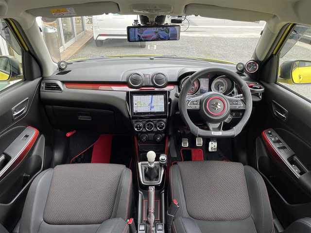 スズキ スイフト スポーツ セーフティPKG 東京都 2019(令1)年 2.8万km チャンピオンイエロー SWKリアウイング/ロッソモデロマフラー/ワンオーナー/社外メモリーナビ/　フルセグTV/DVD/CD/Bluetooth/バックカメラ/デュアルセンサーブレーキサポート/車線逸脱警報/アダプティブクルーズコントロール/ミラー型ドライブレコーダー/LEDヘッドライト/フォグランプ/オートライト/ビルトインETC/シートヒーター/ステアリングスイッチ/プッシュスタート/スマートキー/電動格納ミラー/ウインカーミラー/横すべり防止/フロアマット/ドアバイザー/保証書/取扱説明書