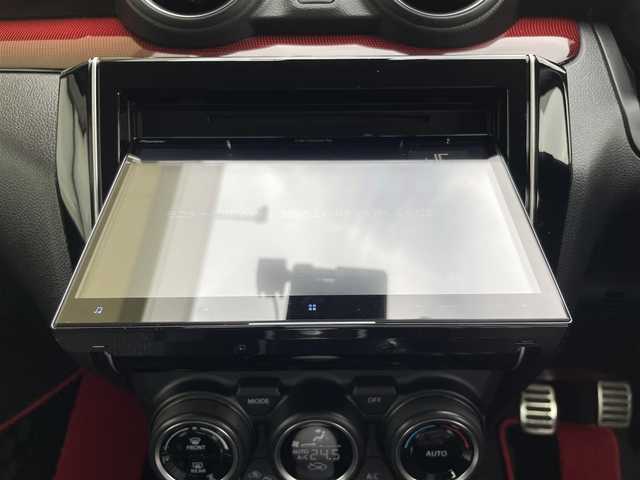 スズキ スイフト スポーツ セーフティPKG 東京都 2019(令1)年 2.8万km チャンピオンイエロー SWKリアウイング/ロッソモデロマフラー/ワンオーナー/社外メモリーナビ/　フルセグTV/DVD/CD/Bluetooth/バックカメラ/デュアルセンサーブレーキサポート/車線逸脱警報/アダプティブクルーズコントロール/ミラー型ドライブレコーダー/LEDヘッドライト/フォグランプ/オートライト/ビルトインETC/シートヒーター/ステアリングスイッチ/プッシュスタート/スマートキー/電動格納ミラー/ウインカーミラー/横すべり防止/フロアマット/ドアバイザー/保証書/取扱説明書