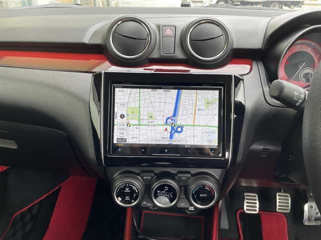 スズキ スイフト スポーツ セーフティPKG 東京都 2019(令1)年 2.8万km チャンピオンイエロー SWKリアウイング/ロッソモデロマフラー/ワンオーナー/社外メモリーナビ/　フルセグTV/DVD/CD/Bluetooth/バックカメラ/デュアルセンサーブレーキサポート/車線逸脱警報/アダプティブクルーズコントロール/ミラー型ドライブレコーダー/LEDヘッドライト/フォグランプ/オートライト/ビルトインETC/シートヒーター/ステアリングスイッチ/プッシュスタート/スマートキー/電動格納ミラー/ウインカーミラー/横すべり防止/フロアマット/ドアバイザー/保証書/取扱説明書