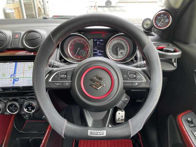 スズキ スイフト スポーツ セーフティPKG 東京都 2019(令1)年 2.8万km チャンピオンイエロー SWKリアウイング/ロッソモデロマフラー/ワンオーナー/社外メモリーナビ/　フルセグTV/DVD/CD/Bluetooth/バックカメラ/デュアルセンサーブレーキサポート/車線逸脱警報/アダプティブクルーズコントロール/ミラー型ドライブレコーダー/LEDヘッドライト/フォグランプ/オートライト/ビルトインETC/シートヒーター/ステアリングスイッチ/プッシュスタート/スマートキー/電動格納ミラー/ウインカーミラー/横すべり防止/フロアマット/ドアバイザー/保証書/取扱説明書
