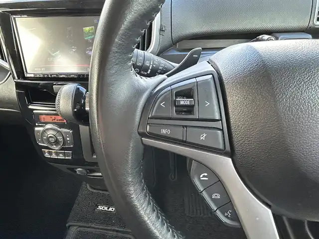 スズキ ソリオ バンディット HV MV 宮城県 2021(令3)年 4.5万km プレミアムシルバーメタリック パワースライドドア（運転席側）/全方位モニター用カメラパッケージ/・フロント/サイド/バックカメラ/・ステアリングスイッチ/・USBソケット/＝＝＝/セーフティサポート/・デュアルカメラブレーキサポート/・後退時ブレーキサポート/・誤発進抑制機能/・後方誤発進抑制機能/・車線逸脱警報機能/・ふらつき警報機能/・先行車発進お知らせ機能/・ハイビームアシスト/・アダプティブクルーズコントロール/リアパーキングセンサー/純正8インチナビ（CN-RZ865）/・CD/DVD/・Bluetooth/・フルセグTV/ビルトインETC/両側パワースライドドア/運転席シートヒーター/革巻きステアリング/パドルシフト/LEDヘッドランプ/フォグランプ/オートライト/スマートキー＆プッシュスタート/電動格納ミラー/純正15インチアルミホイール/純正フロアマット/純正ドアバイザー/W/サイド/カーテンエアバッグ