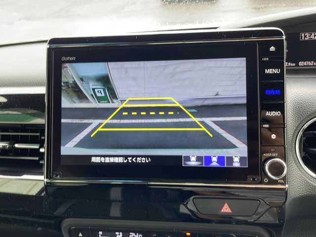 ホンダ Ｎ ＢＯＸ カスタム EX ターボ 静岡県 2021(令3)年 2.5万km プラチナホワイトパール プッシュスタート/スマートキー/ホンダセンシング/純正ナビ/　フルセグTV/BTオーディオ/MSV/バックカメラ/パドルシフト/両側パワースライドドア/ハーフレザーシート/シートヒーター/オートライト/LEDヘッドライト