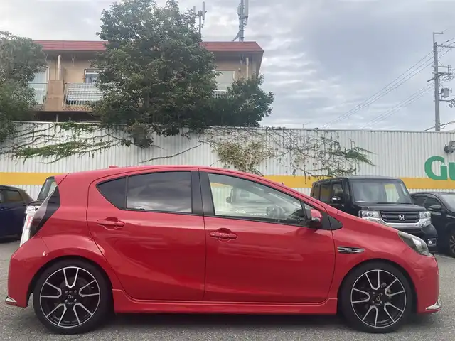 トヨタ アクア G G’s 兵庫県 2015(平27)年 5.1万km スーパーレッドⅤ 純正SDナビ/FM/AM/フルセグTV/CD/DVD/Bluetooth/バックカメラ/プッシュスタートボタン/クルーズコントロール/シートヒーター/スマートキー×2/ステアリングスイッチ/電動格納ミラー/プッシュスタートボタン/革巻きステアリング/ETC/オートライト/Gs’アルミホイール/Gsフロアマット