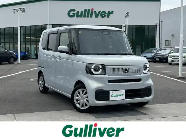 ホンダ Ｎ ＢＯＸ 愛媛県 2023(令5)年 0.3万km プレミアムサンライトホワイトパール 禁煙車/登録時走行距離：2763km/ディーラーオプション純正ディスプレイオーディオ/フルセグTV/Bluetooth/バックカメラ/前方ドライブレコーダー/ビルトインETC/衝突被害軽減システム/クリアランスソナー/横滑り防止装置/レーンキープアシスト/レーダークルーズコントロール/LEDヘッドライト/オートライト/前席シートヒーター/両側パワースライドドア/エンジンスタートボタン/スマートキー/スペアキー/純正フロアマット