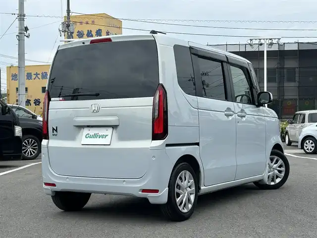 ホンダ Ｎ ＢＯＸ 愛媛県 2023(令5)年 0.3万km プレミアムサンライトホワイトパール 禁煙車/登録時走行距離：2763km/ディーラーオプション純正ディスプレイオーディオ/フルセグTV/Bluetooth/バックカメラ/前方ドライブレコーダー/ビルトインETC/衝突被害軽減システム/クリアランスソナー/横滑り防止装置/レーンキープアシスト/レーダークルーズコントロール/LEDヘッドライト/オートライト/前席シートヒーター/両側パワースライドドア/エンジンスタートボタン/スマートキー/スペアキー/純正フロアマット