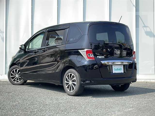 ホンダ フリード G ジャストセレクション 福岡県 2014(平26)年 8.7万km プレミアムスパークルブラックパール 純正７インチナビ　/(バックカメラ/ＴＶ/ＤＶＤ/Ｂｌｕｅｔｏｏｔｈ/ＣＤ)/片側パワースライドドア　/ビルトインＥＴＣ　/横滑り防止装置　/スマートキー　/ドアバイザー　/純正フロアマット